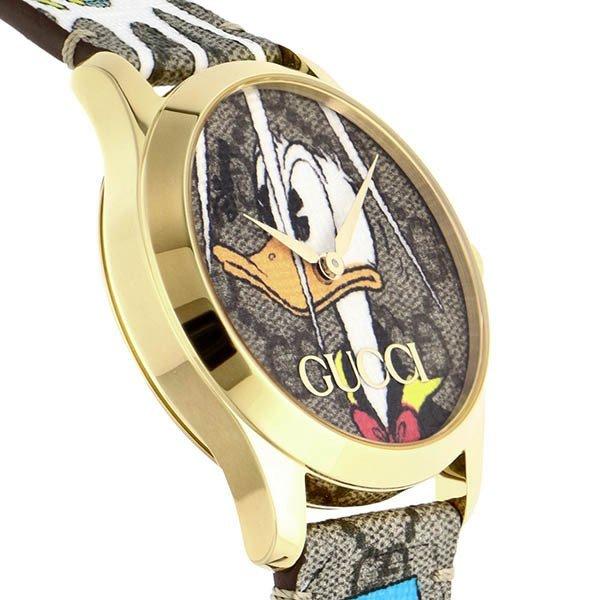 Gucci G Zeitlose Disney Donald Duck Uhr, braunes Zifferblatt, braune Lederarmbanduhr für Damen – YA1264167
