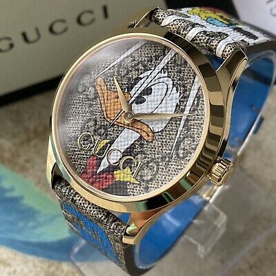 Gucci G Zeitlose Disney Donald Duck Uhr, braunes Zifferblatt, braune Lederarmbanduhr für Damen – YA1264167