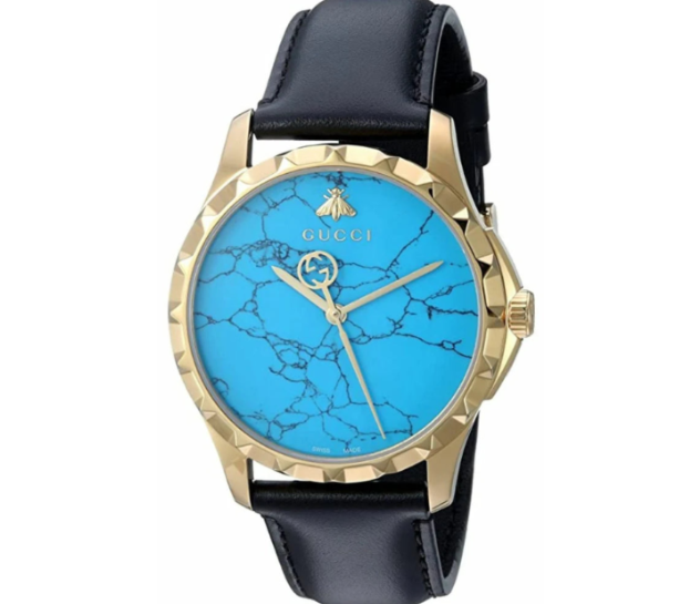 Gucci G Timeless Herrenuhr mit türkisblauem Zifferblatt und schwarzem Lederarmband - YA126462