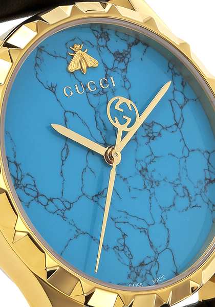 Gucci G Timeless Herrenuhr mit türkisblauem Zifferblatt und schwarzem Lederarmband - YA126462