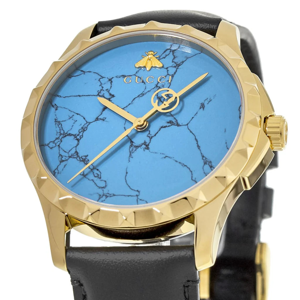 Gucci G Timeless Herrenuhr mit türkisblauem Zifferblatt und schwarzem Lederarmband - YA126462