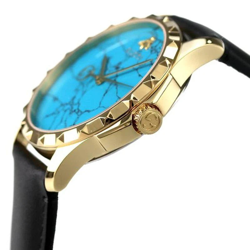 Gucci G Timeless Herrenuhr mit türkisblauem Zifferblatt und schwarzem Lederarmband - YA126462