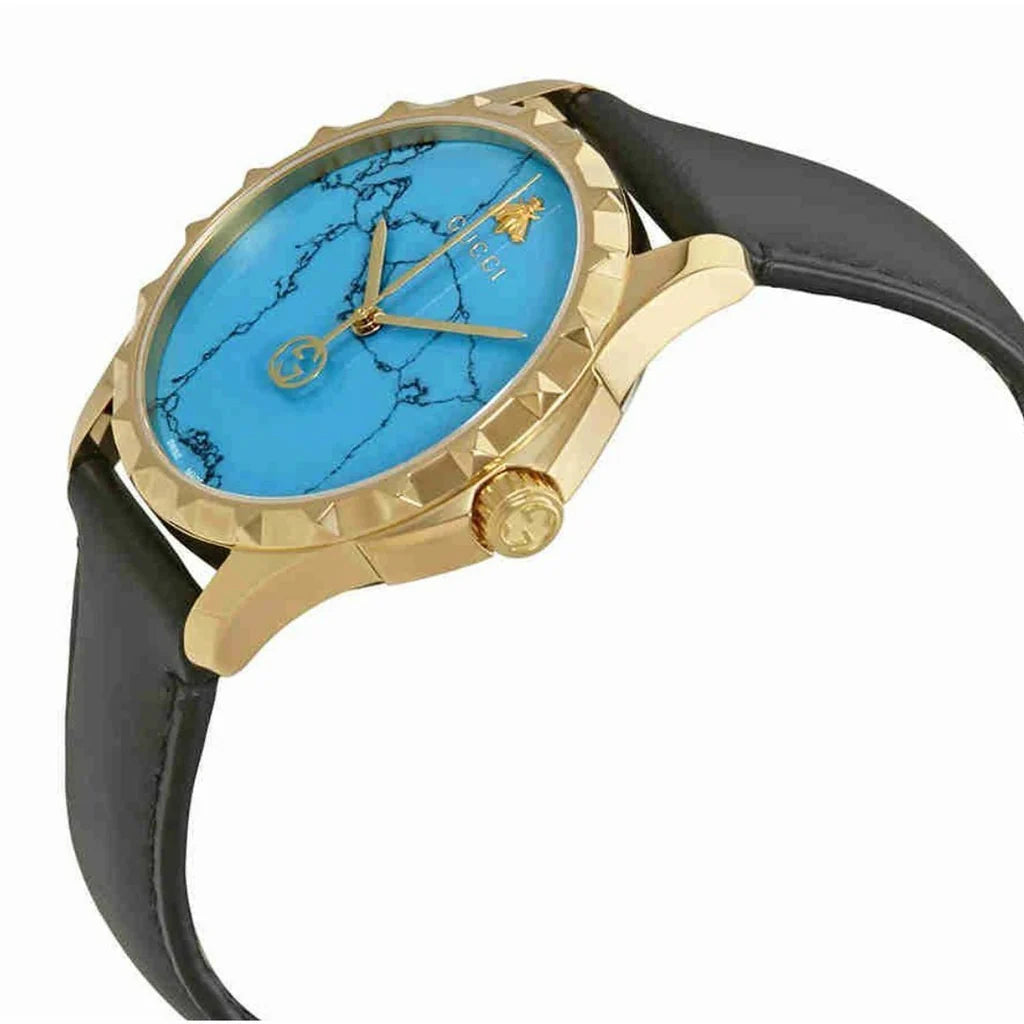 Gucci G Timeless Herrenuhr mit türkisblauem Zifferblatt und schwarzem Lederarmband - YA126462