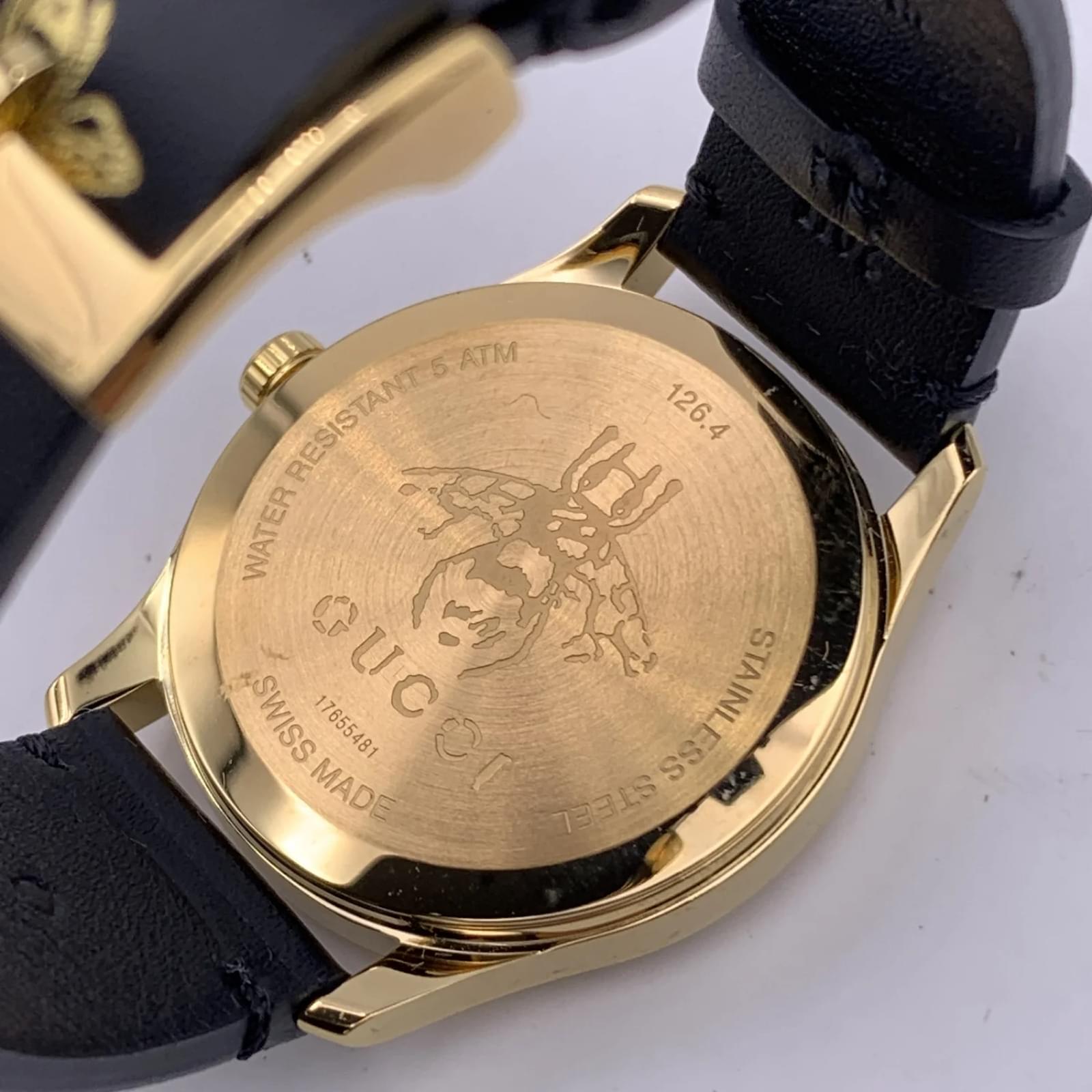 Gucci G Zeitlose Gucci Uhr  für Damen, schwarzes Zifferblatt schwarzes Lederarmband - YA1264055