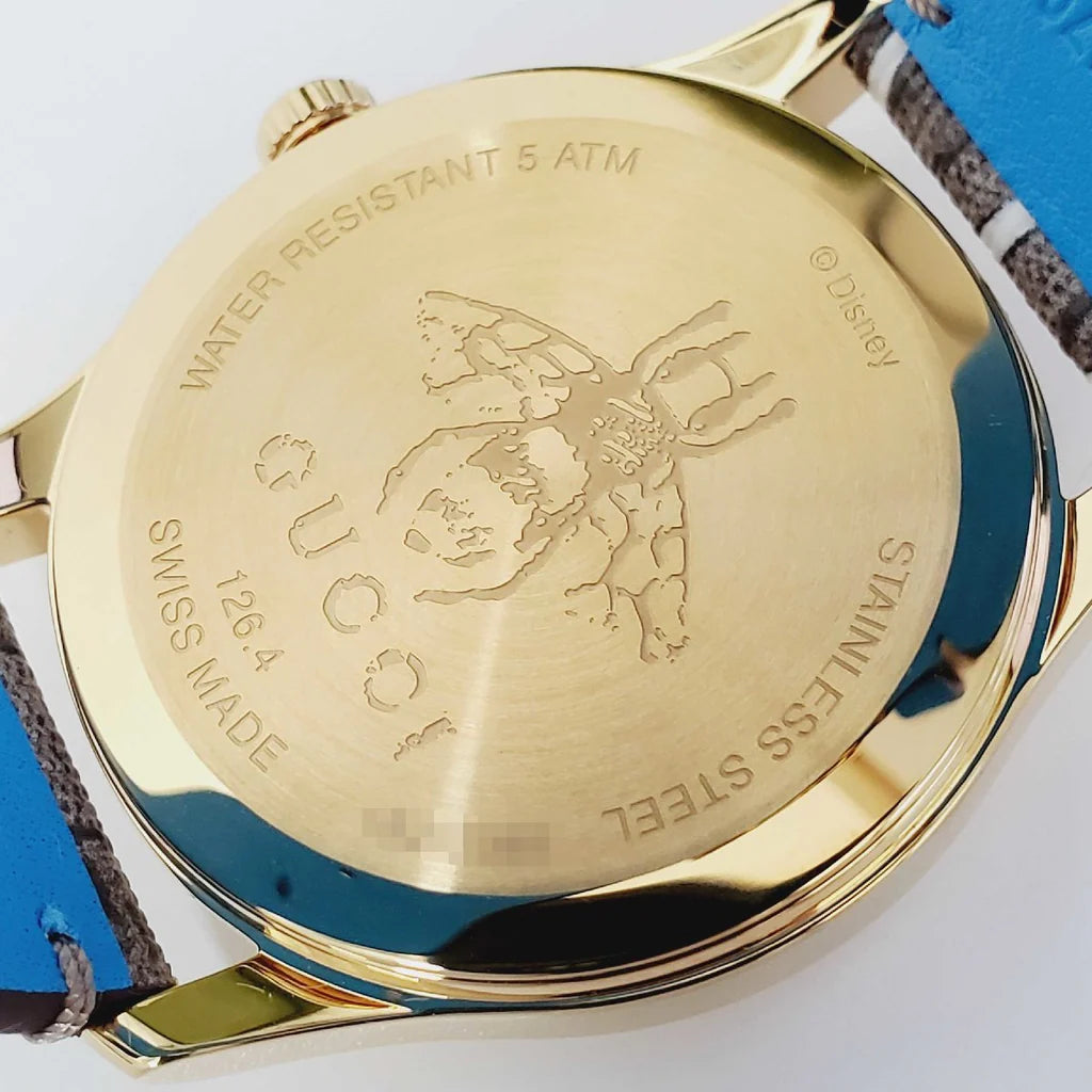 Gucci G Zeitlose Disney Donald Duck Uhr,  braunes Zifferblatt, braune Lederarmbanduhr für Damen – YA1264167