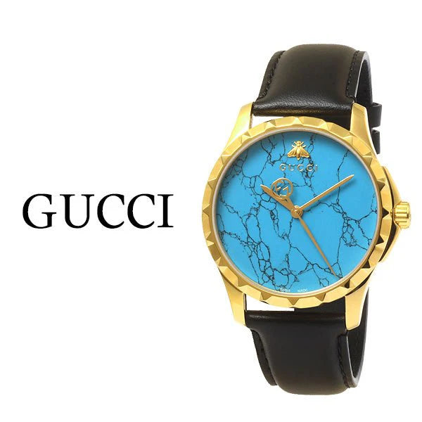 Gucci G Timeless Herrenuhr mit türkisblauem Zifferblatt und schwarzem Lederarmband - YA126462